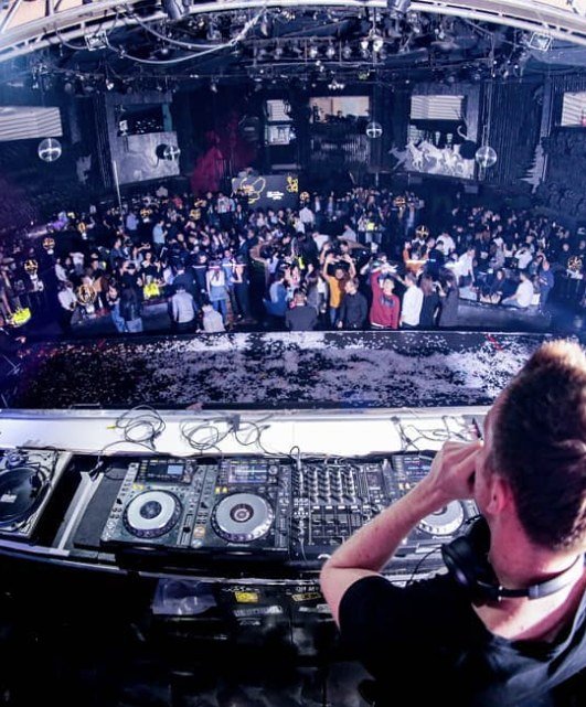 Club crowd seen from the DJ booth